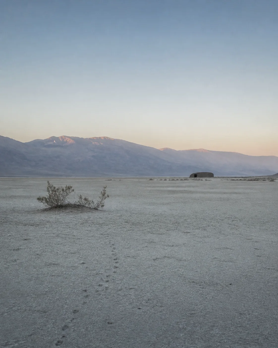 Isolated Else retreat beside a quiet dry lake